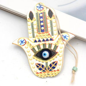 Detailed Hamsa Hand keychain featuring colorful floral patterns and a blue Evil Eye glass charm