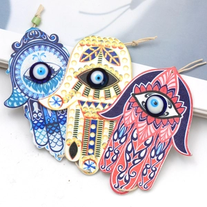 Hamsa Hand and Evil Eye wooden keychains in blue, yellow, and red color sets