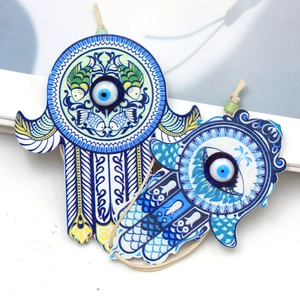 Hamsa hand wood keychain with evil eye bead and Tree of Life patterns for car or bag