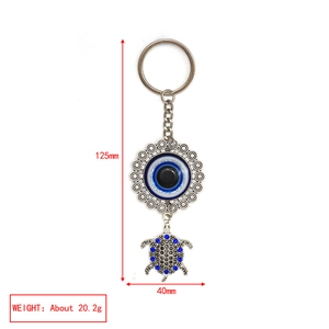 Detailed dimensions of the turtle evil eye keychain with size and weight measurements
