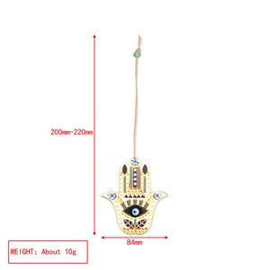 Detail view of Hamsa Hand and Evil Eye pendant showing size 84mm and 200mm length