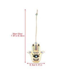 Detailed size chart showing Hamsa Hand Evil Eye wooden charm dimensions in centimeters
