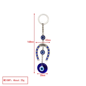 Paramètres de taille du porte-clés fer à cheval Mauvais Œil avec pendentif bleu