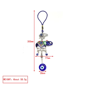 Detailed blue elephant evil eye pendant showing total height 300mm and weight 58.5g