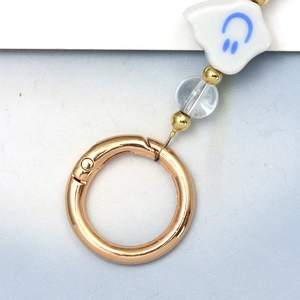 Turkish blue eye keychain with golden spring clasp and white star smile bead pendant