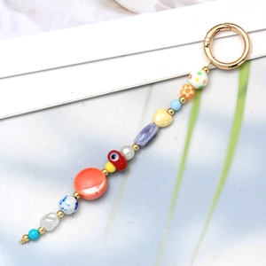 Handmade colorful beaded keychain with Turkish evil eye and golden spring ring clasp