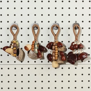 Bohemian style natural seed shell charms with handmade woven ropes and wooden beads