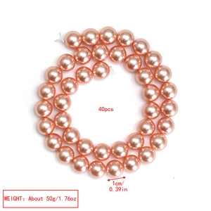 Detailansicht der 1cm rosa Perlglanz-Perlen im 40er-Set für DIY-Schmuckherstellung