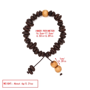 Detail view of coffee bean bead bracelet showing adjustable drawstring and size parameters