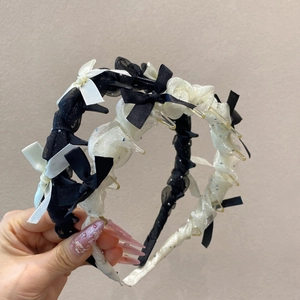 Détails des serre-têtes en maille noir et blanc avec strass et pinces à cheveux intégrées