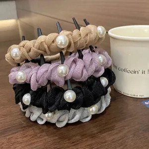 Set of four woven headband hair accessories with pearls in beige, purple, black and grey