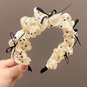 Retro cream beige polka dot pleated flower headband with black ribbon bows for women
