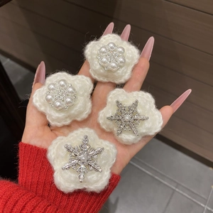 Winter snowflake hair clips with white plush flowers, pearls, and crystals in 4-piece set