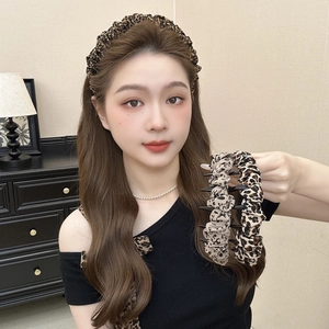 Vintage leopard print hair accessory set with wide headband and matching scrunchies