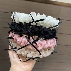 Détail de serre-têtes en tissu en quatre couleurs avec mini nœuds noirs style Lolita