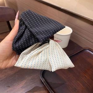 Elegant fabric triangle hair claw clip with classic polka dot pattern for women