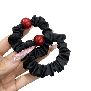 Elegant black satin scrunchie set with large red beads for high elasticity ponytails