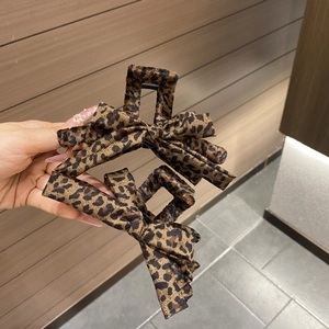 Set of two vintage leopard print fabric bow hair claws with high-quality texture