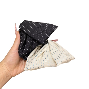 Polka dot fabric bow hair claw clips for women with elegant minimalist aesthetic