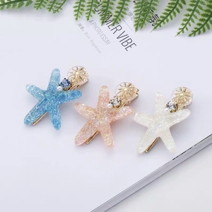 Lot de barrettes étoile de mer bleu, rose et blanc avec perles et paillettes