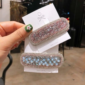 Sparkling crystal rhinestone BB hair clips in pink and blue for elegant women