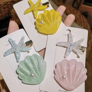 Seestern und Muschel Haarspangen mit Perlen und Glitzer in verschiedenen Pastelltönen