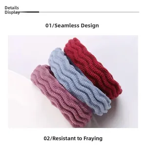 Detail of wave-textured seamless hair ties in burgundy, sky blue, and lotus pink colors