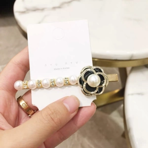 Elegant camellia flower hair clip with white pearls and sparkling rhinestones on gold alloy