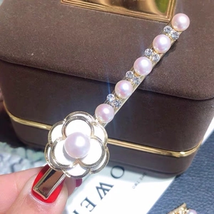 Elegant camellia hair clip with pink pearls and rhinestones on gold alloy base