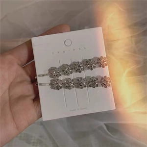 Sparkling silver crystal snowflake hair clips set for women in Korean minimalist style