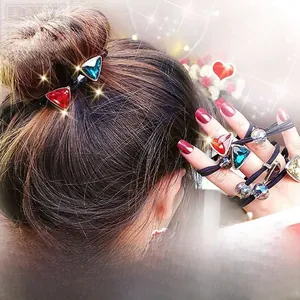 Detail of high-elasticity hair ties with triangular sparkling rhinestones in multi colors