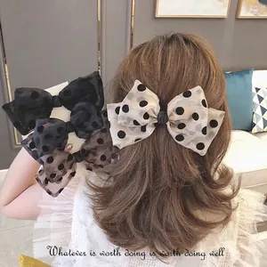 Elegant polka dot organza bow hair clips in black and beige for women stylish hair decor