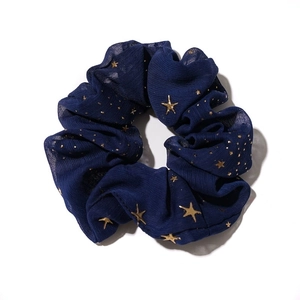Elegant navy blue chiffon scrunchie with golden stars and dot patterns for women