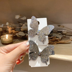 Fermaglio per capelli a farfalla barocca con strass scintillanti in bianco e grigio