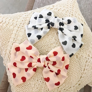 Oversized satin double layer bow hair clips with black and red heart patterns