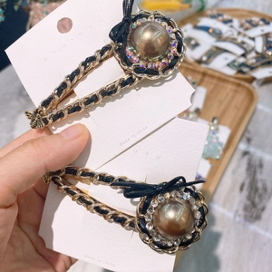 Vintage hair clip with brown pearl, rhinestone border and black gold woven chain strap