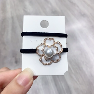 Vintage floral hair scrunchie with white enamel camellia and pearl pendant charm
