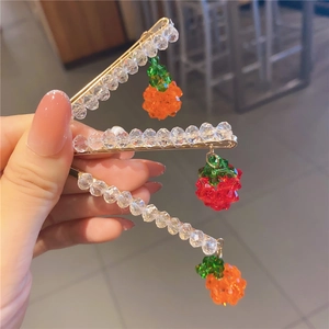 Three-piece set of crystal beaded fruit charms hair clips featuring orange and strawberry