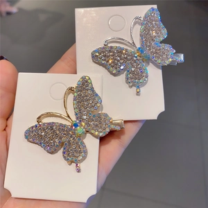 Elegant butterfly hair clips with crystals and rhinestones in gold and silver finish