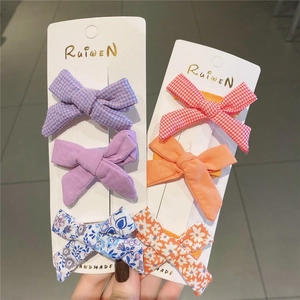 Set da 6 pezzi di graziose mollette a fiocco per bambine con motivi a quadri e fiori