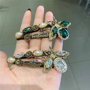 Vintage gold bee hair clip set with green crystals, pearls, and Sunflower engraving
