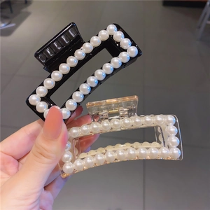 Elegant rectangular hair claw clips with white pearl trim in black and clear gold