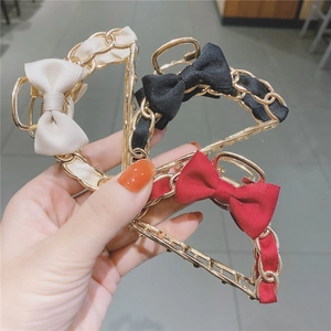 Handheld vintage metal chain hair claw clips with bow in red black and white colors