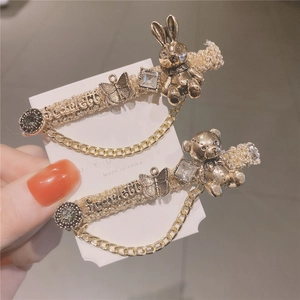 Fermaglio per capelli vintage con orsetto, coniglio e catenella in metallo dorato