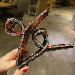 Elegante pinza per capelli grande marrone traslucido con strass colorati per donne