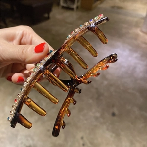 Elegante fermaglio per capelli in resina ambrata con strass colorati per acconciature
