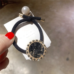 French style tweed scrunchie with rhinestones and white pearl on a black elastic band
