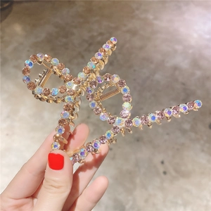 Pince à cheveux nœud de style français avec strass AB colorés sur base dorée