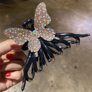 Pince à cheveux papillon étincelante avec strass champagne pour coiffure femme