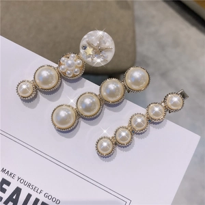 Lot de barrettes dorées avec perles blanches et pendentif étoile de mer en résine
